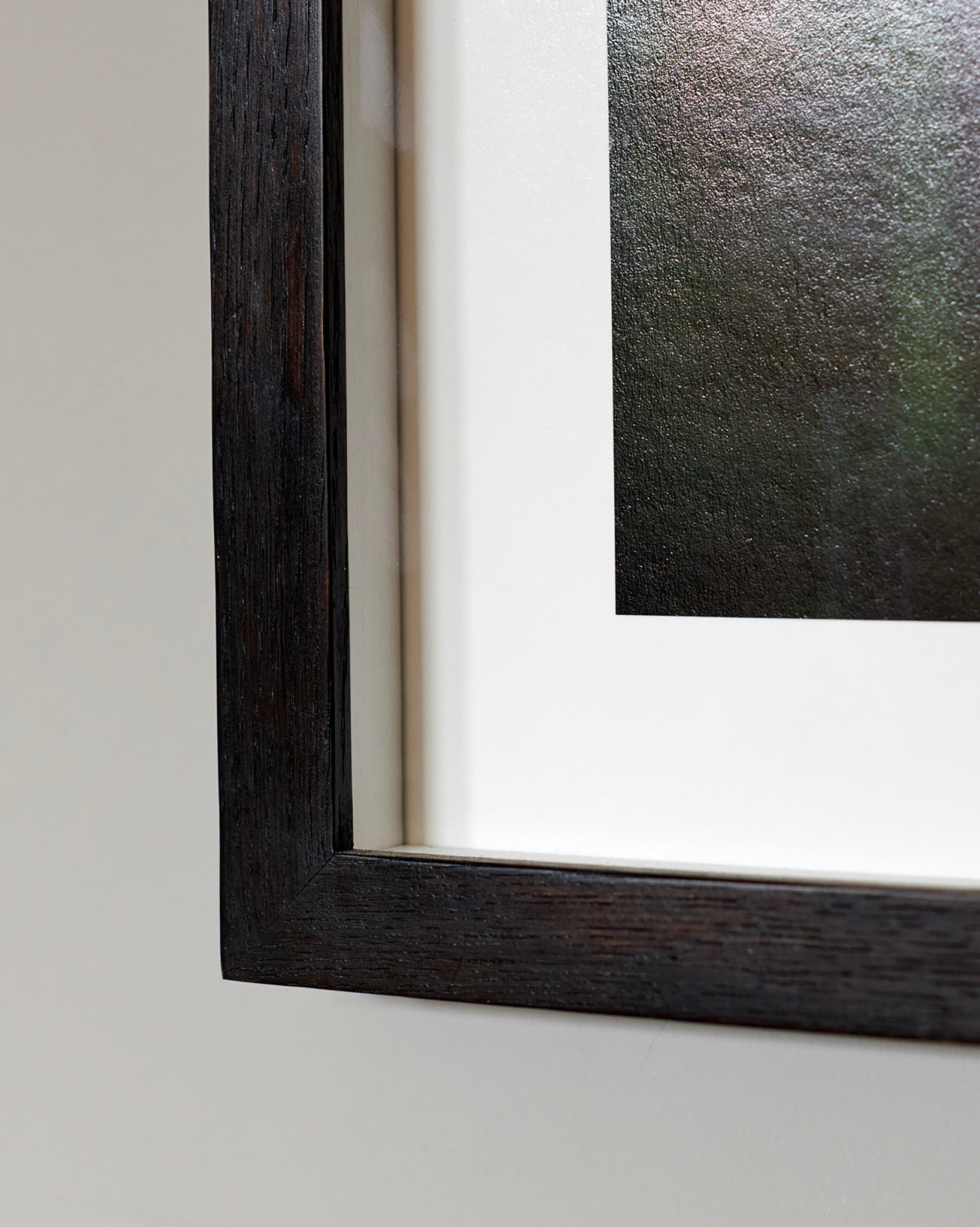 Corner detail of Bespoke Gallery Quality Black Wood Box Spacer Frame with Spacer Visible.